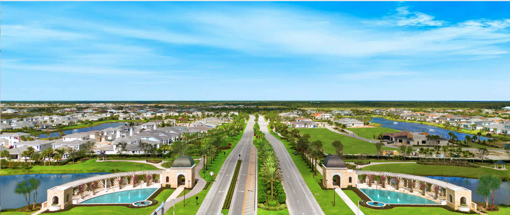 Aerial view of Avenir in Palm Beach Gardens with new construction homes, lakes, and large green preserve areas in a modern master-planned community